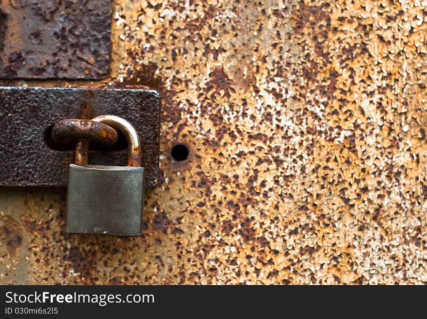 Old rusty padlock for background. Old rusty padlock for background