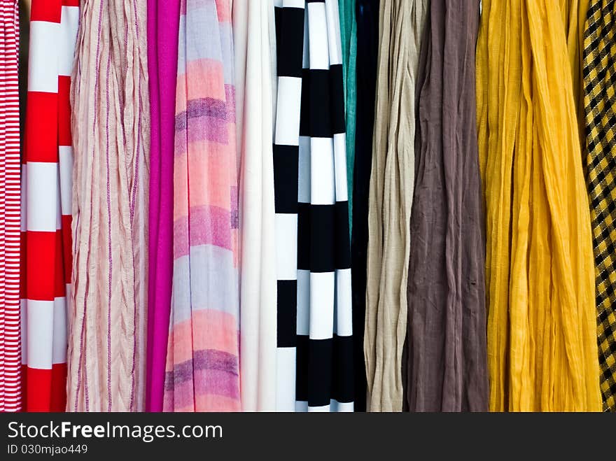 Lots of colorful cloth towels as a background or texture. Lots of colorful cloth towels as a background or texture