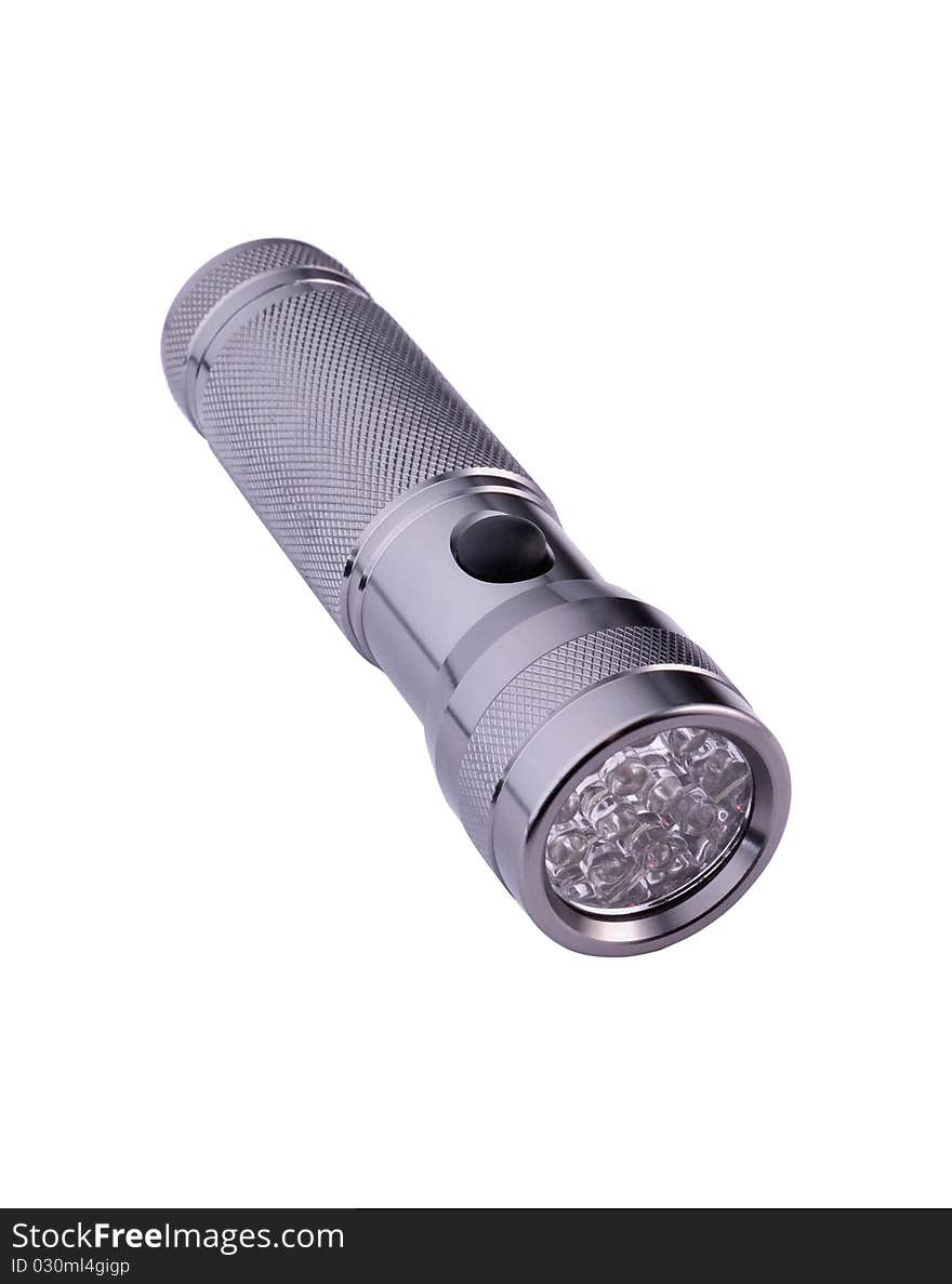 Light aluminium flashlight on a white background