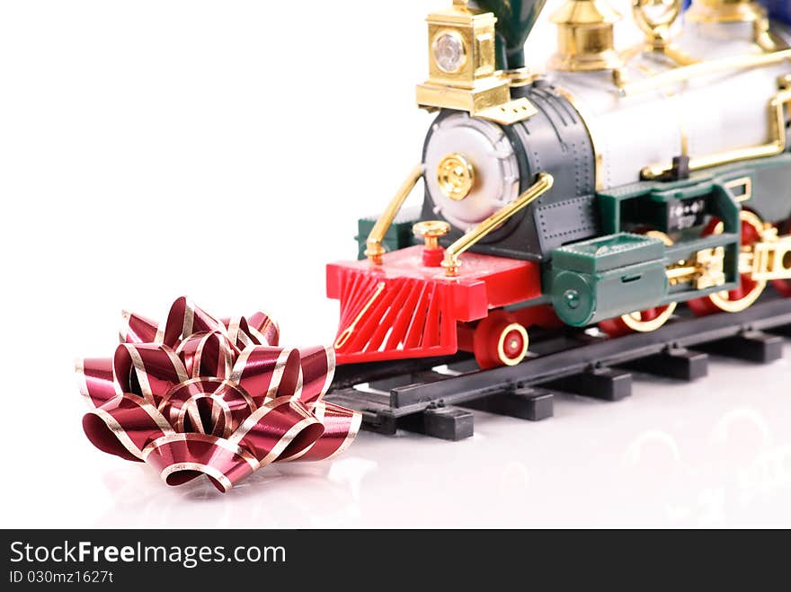 Christmas Bow with Holiday Toy Train. Christmas Bow with Holiday Toy Train