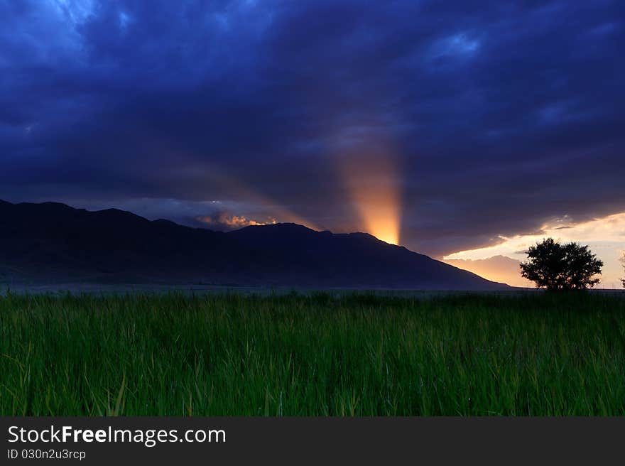 Beautiful landscape of a sunset behind mountain