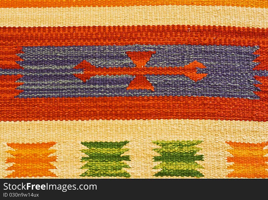 Landscape view of colored textile on a carpet background. Landscape view of colored textile on a carpet background