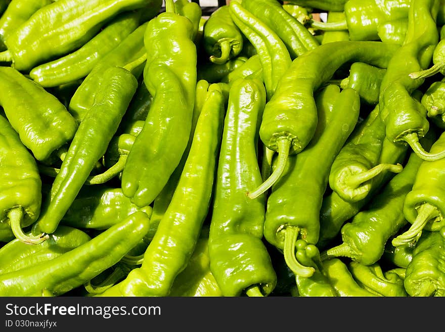 Landscape view of green peppers background. Landscape view of green peppers background