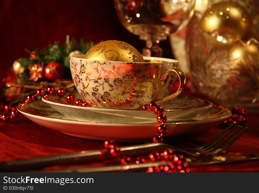 Christmas table with gold dishes. Christmas table with gold dishes