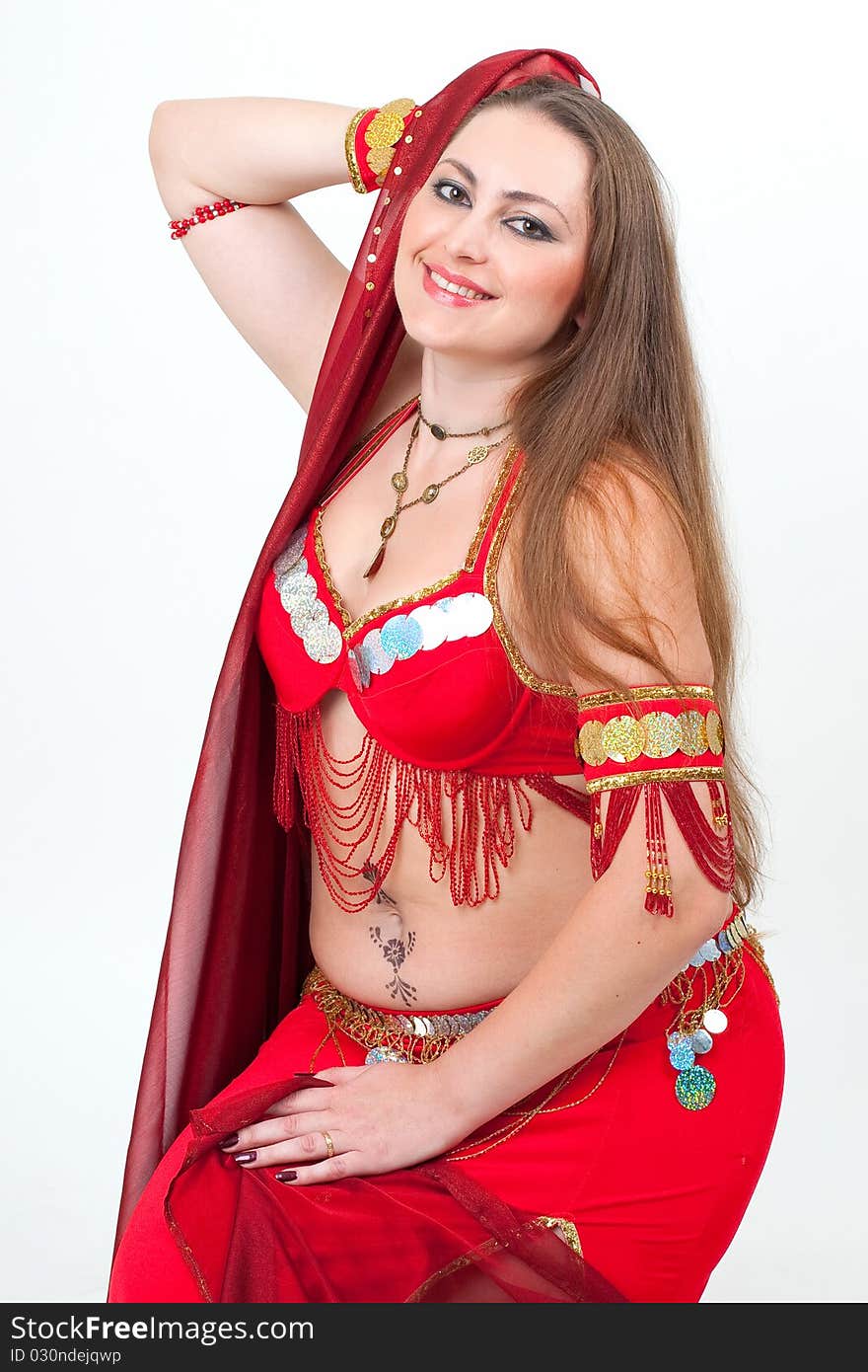 Arabic dancer in traditional red dress