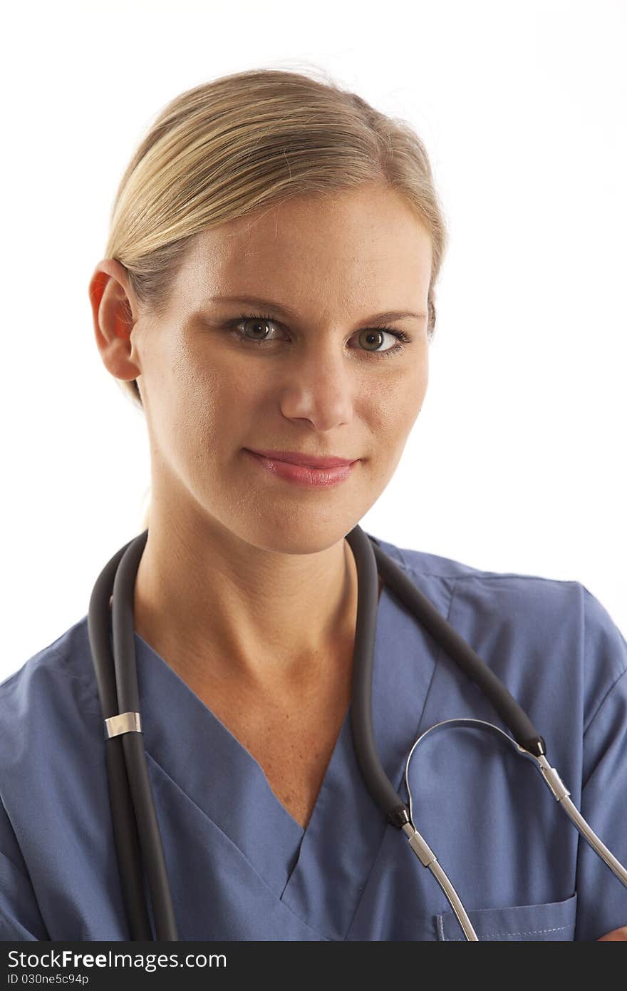 Portrait of young female nurse in scrubs with stethoscope