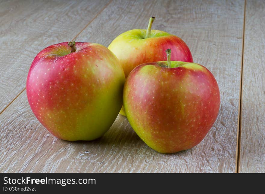 Apple on a wooden table