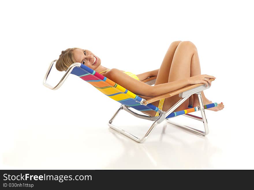 Young Woman Relaxing In Beach Chair