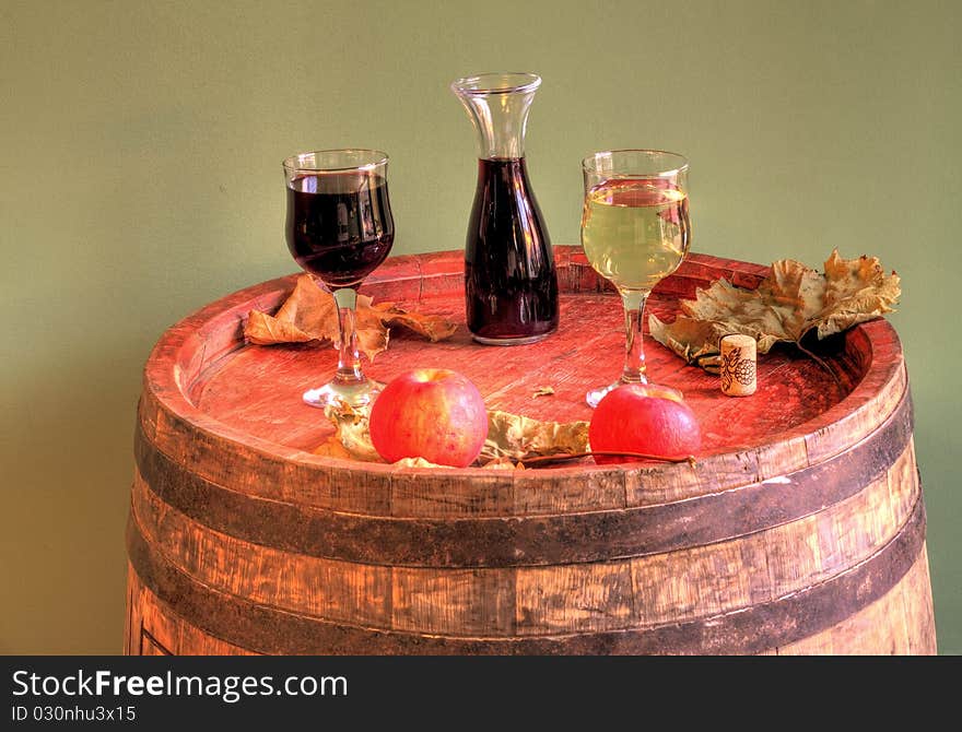 Autumn.. red and white wine on a barrel