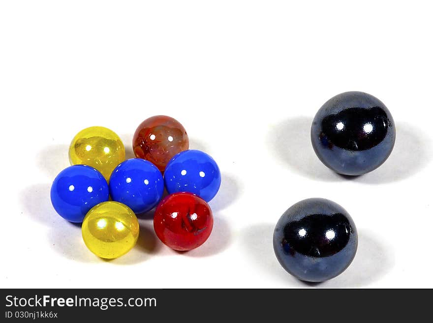 Colored glass beads on a white background. Colored glass beads on a white background