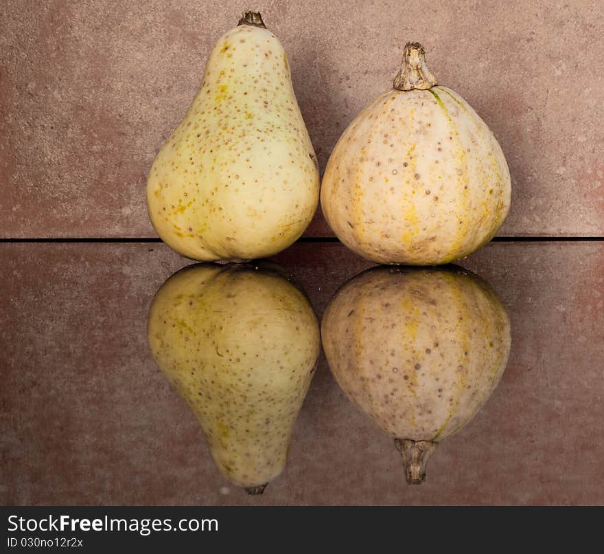 Two Squash Reflected