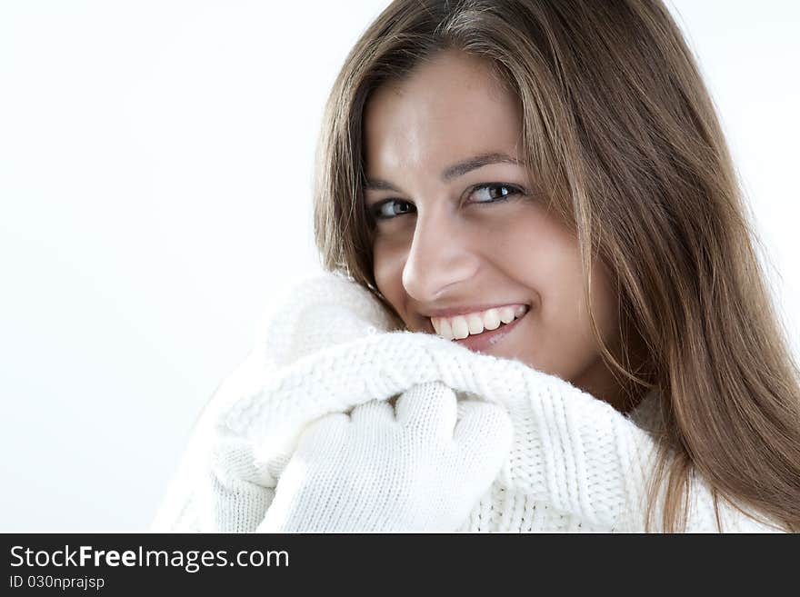 Portrait of a young woman in sof white sweater. Portrait of a young woman in sof white sweater