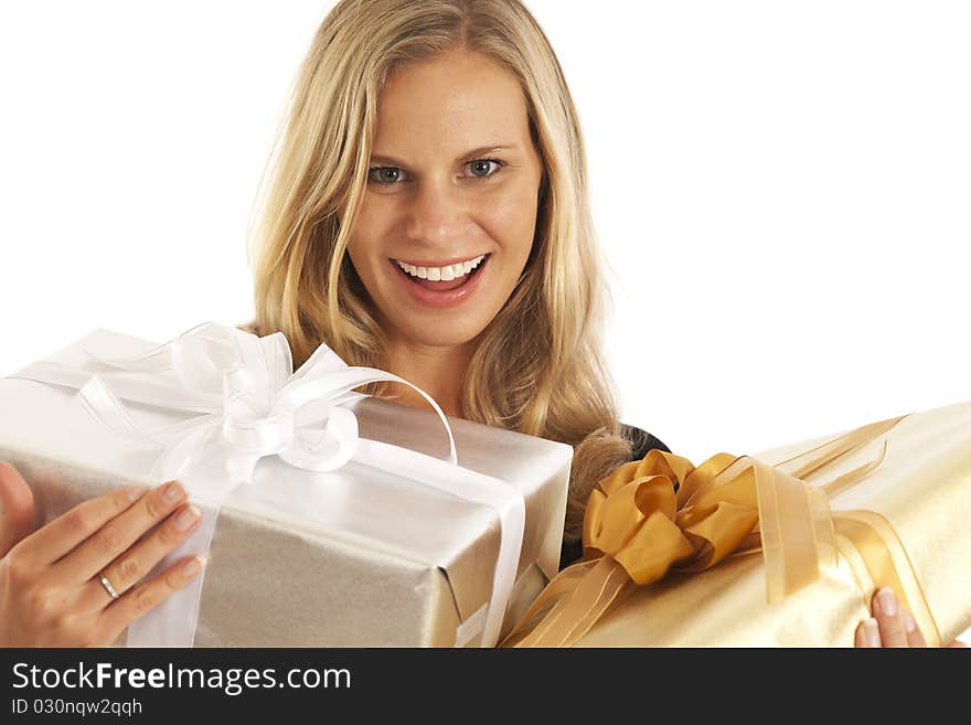 Young woman in black holding elegant gold and silver presents. Young woman in black holding elegant gold and silver presents