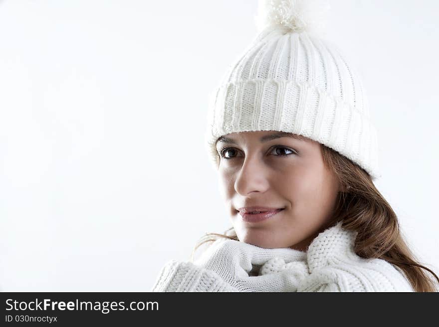 Portrait of a young woman in sof white sweater. Portrait of a young woman in sof white sweater