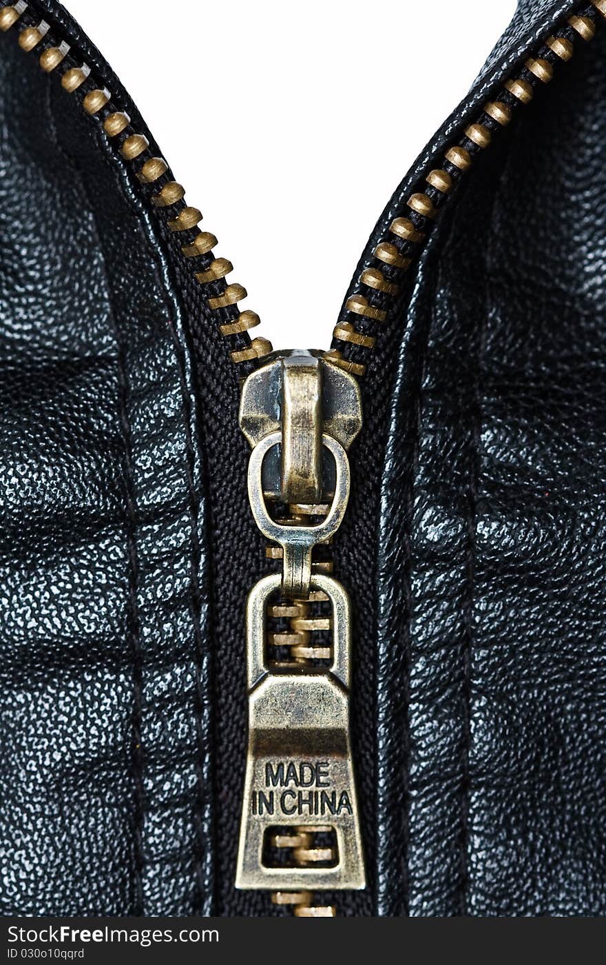 Metal zip and texture of artificial leather. Metal zip and texture of artificial leather