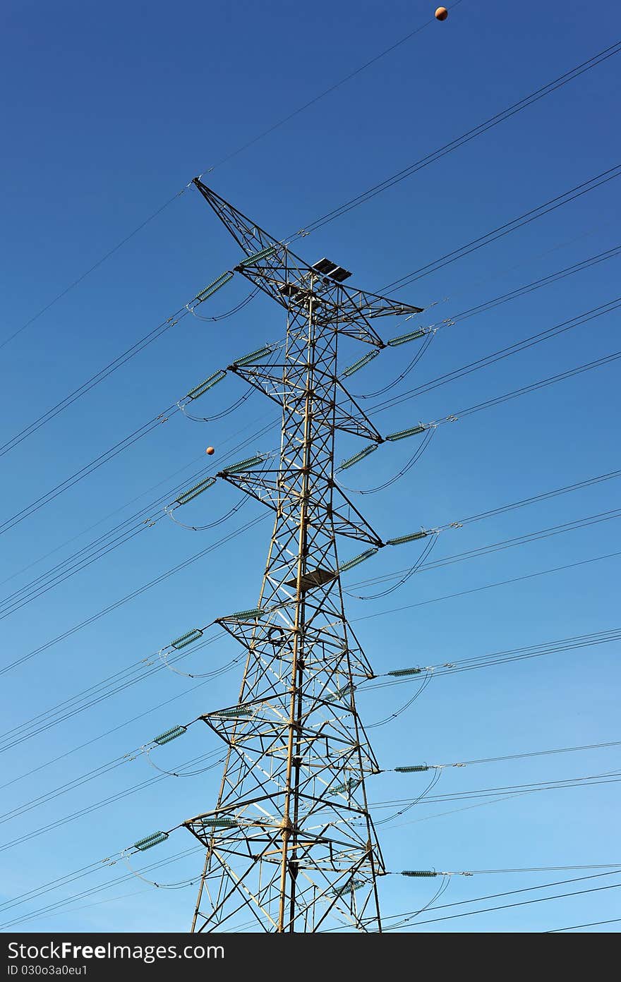 Electrical power station in a pretty blue sky.