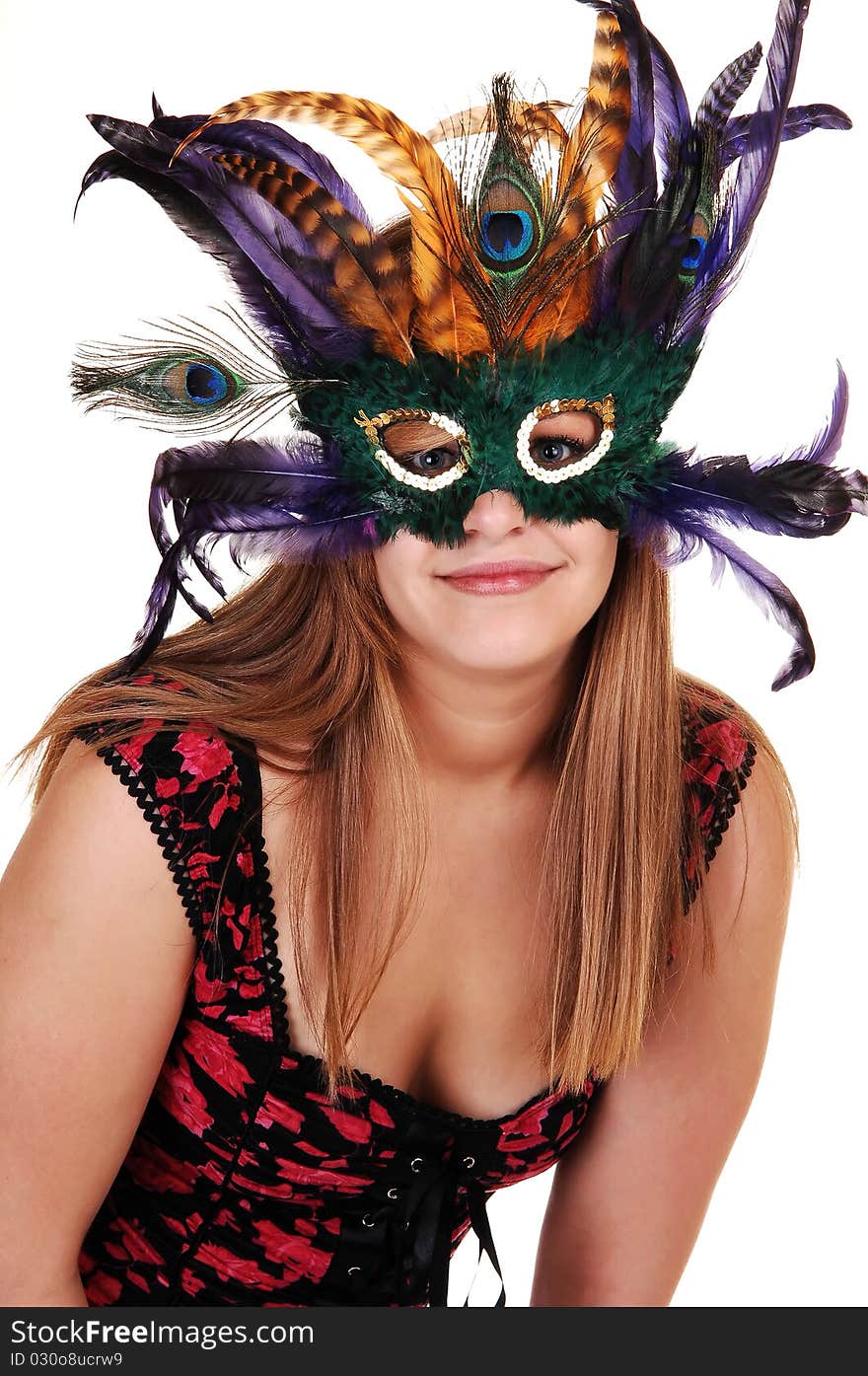 A young pretty woman a red black vest standing in the
studio with a mask over her eyes and hair, for white background. A young pretty woman a red black vest standing in the
studio with a mask over her eyes and hair, for white background.