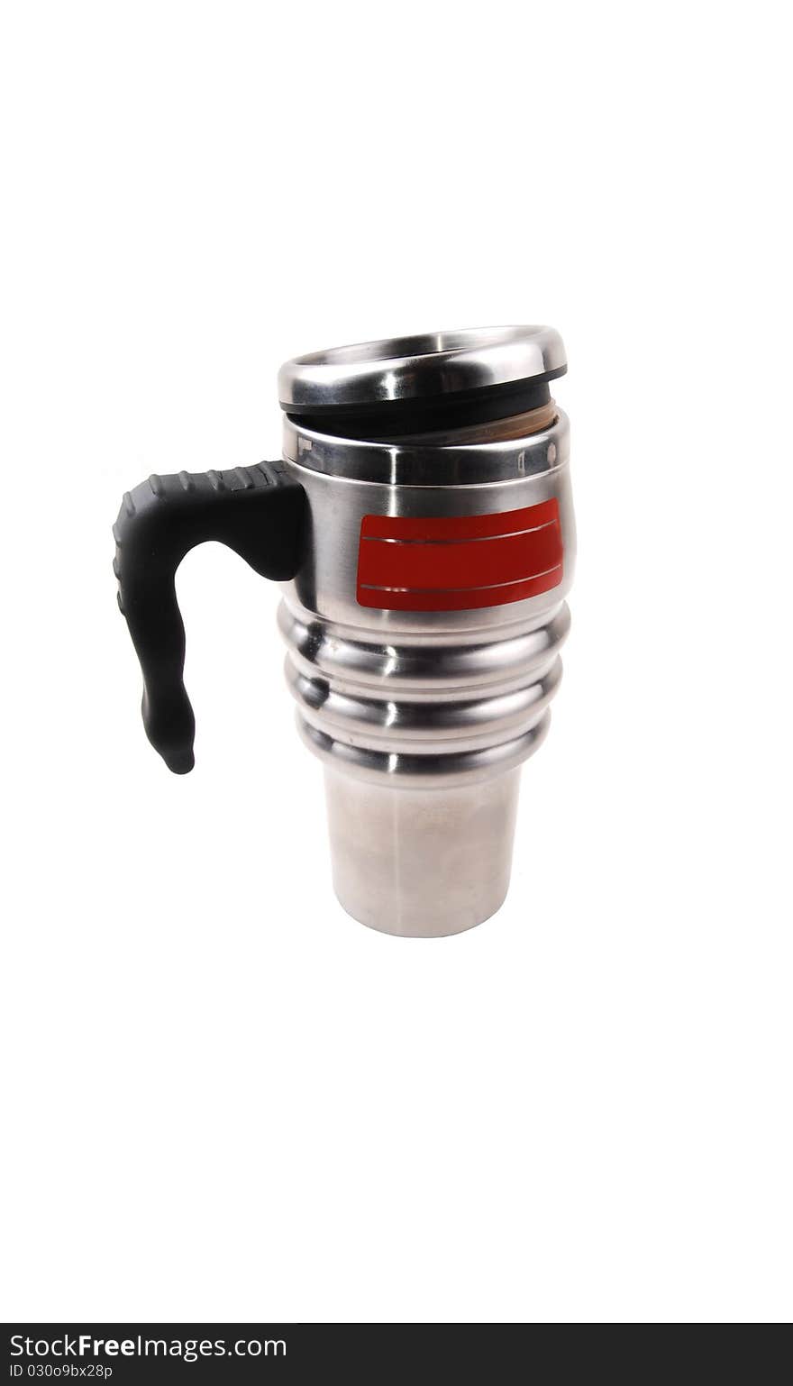 A handy stainless steel thermos coffee cup with a black plastic handle, for white background. A handy stainless steel thermos coffee cup with a black plastic handle, for white background.