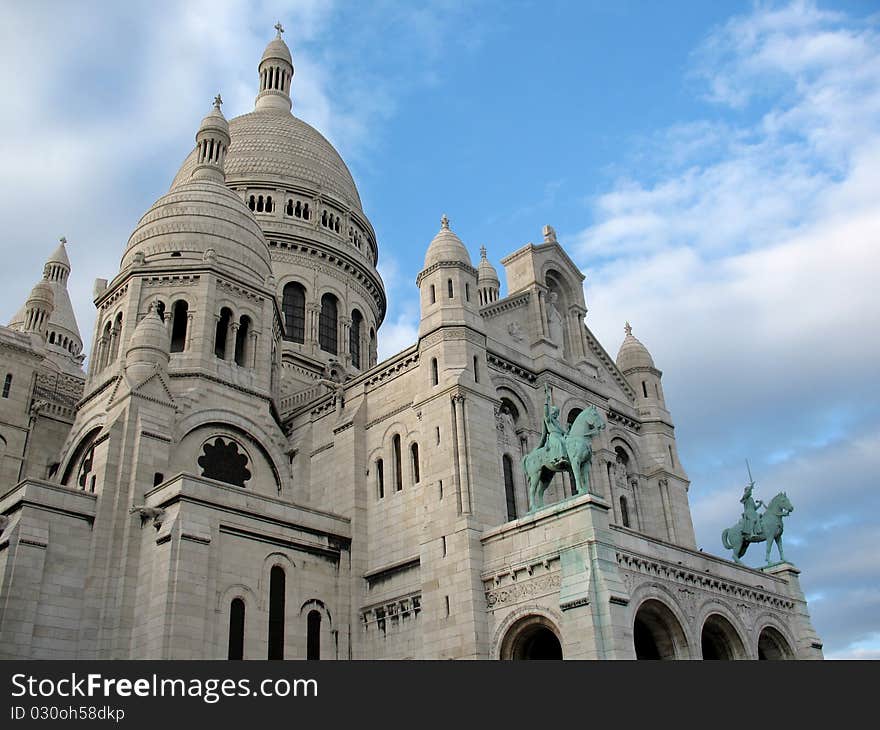 There are  church and  blue sky. Paris