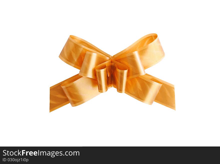 Golden decorative bow isolated on white background. Golden decorative bow isolated on white background