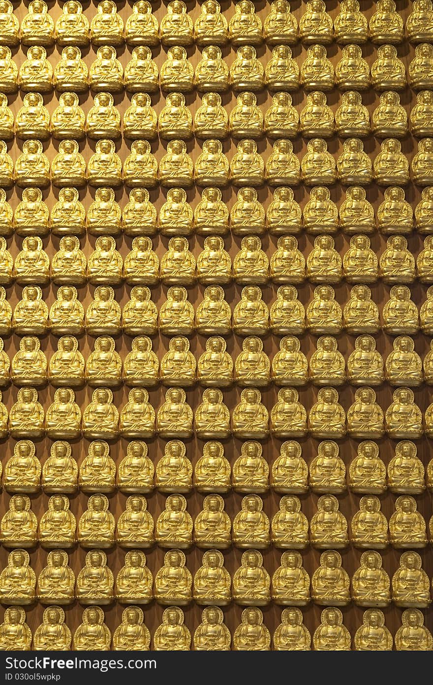 Buddha statue on the wall in Chinese Temple