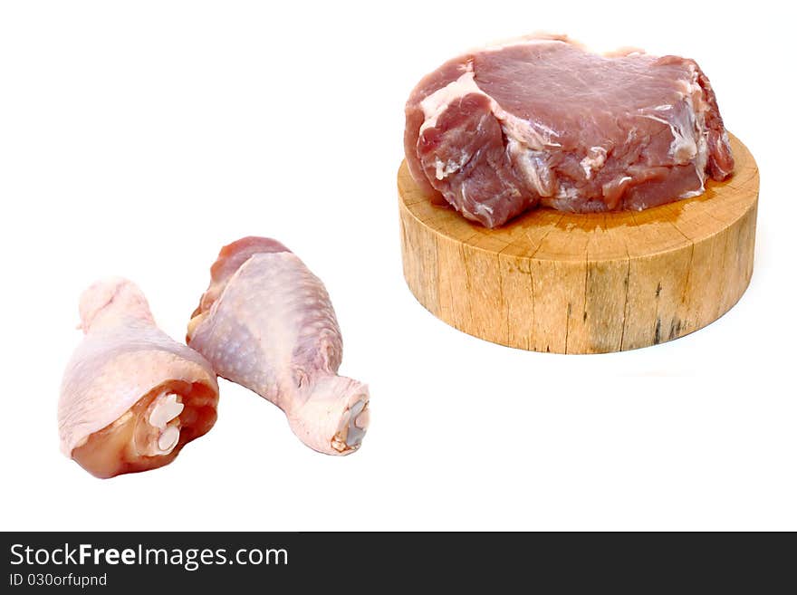 Raw pork and chicken isolated on white. Raw pork and chicken isolated on white