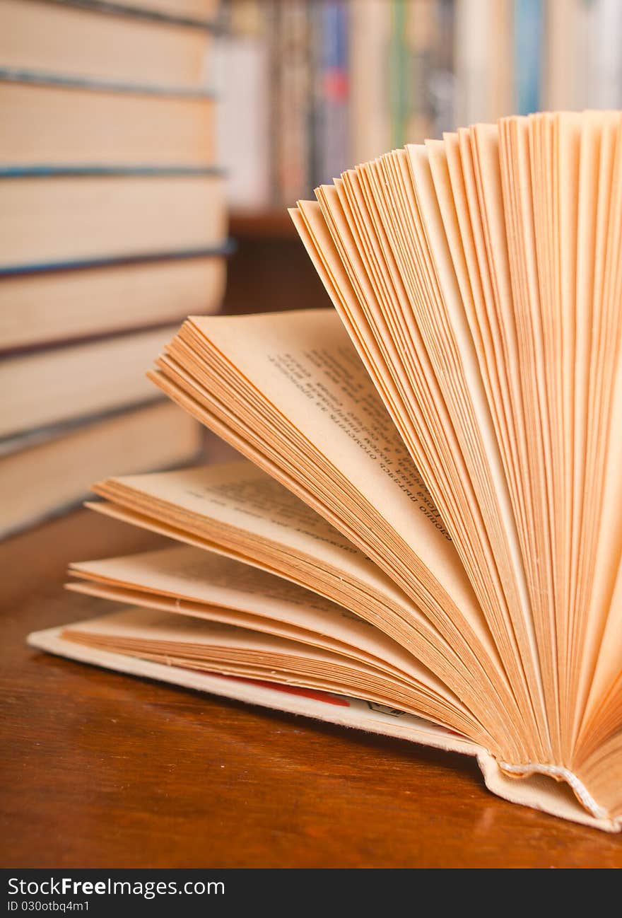 Closeup shot of opened book isolated on white background. macro. Closeup shot of opened book isolated on white background. macro.