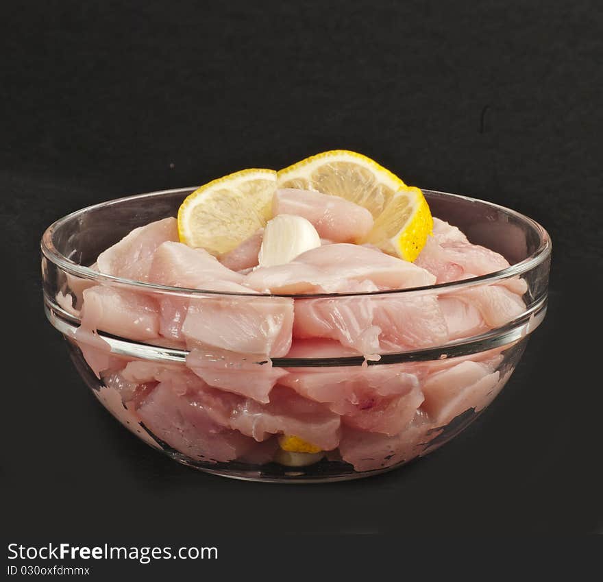 Raw sliced chicken meat