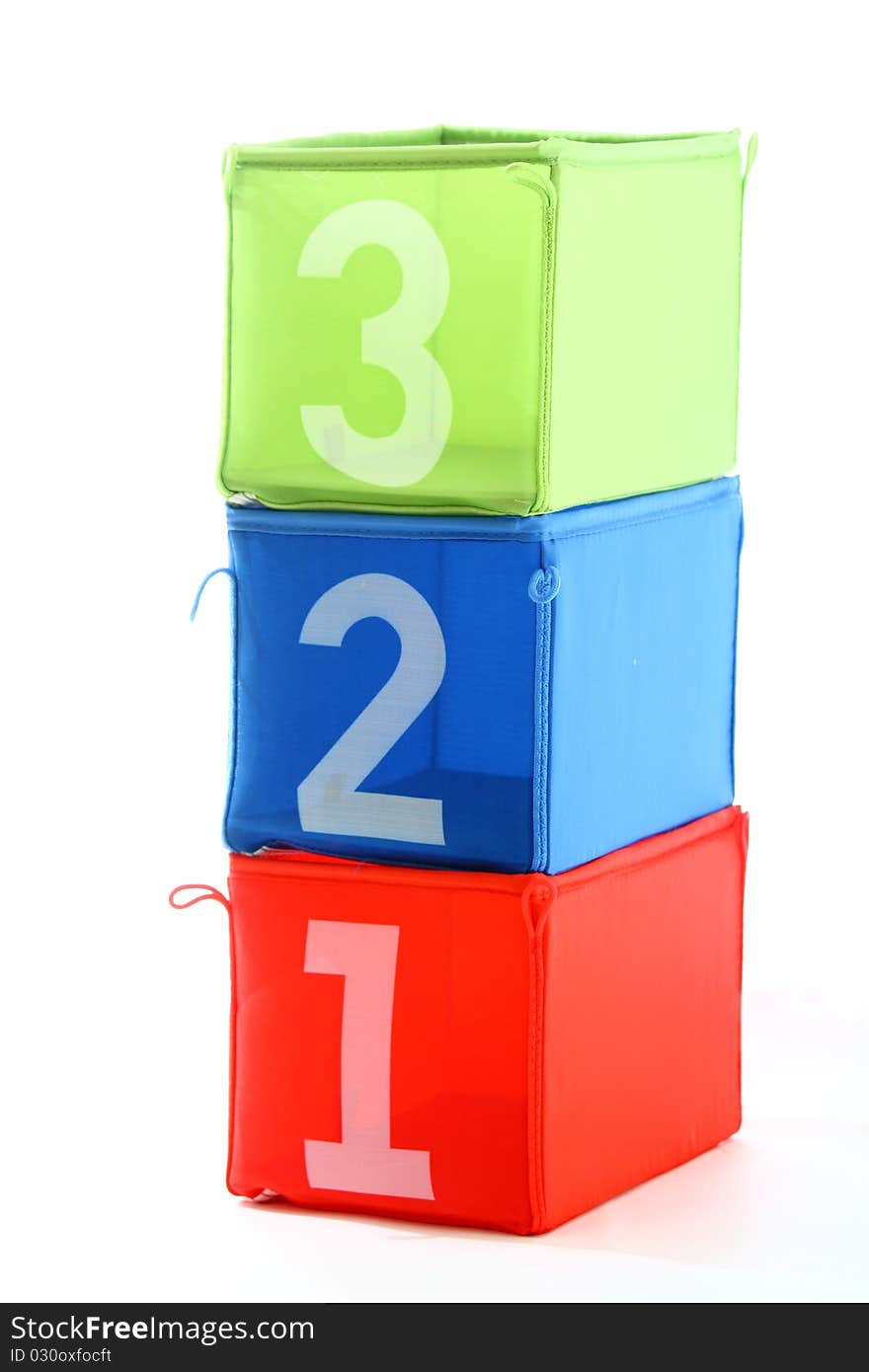 Multicolored containers with numbers isolated on white. Multicolored containers with numbers isolated on white