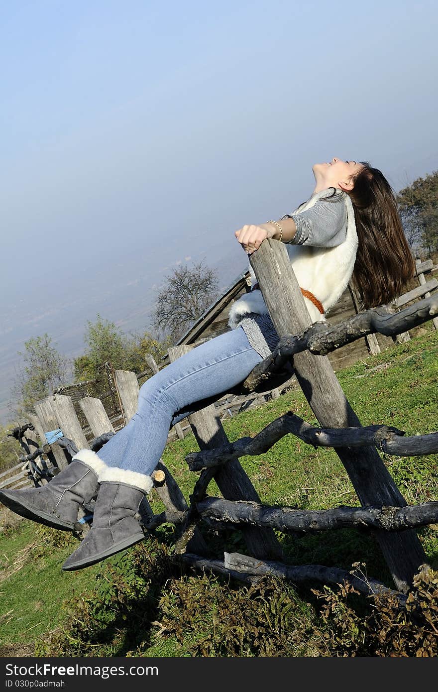 Happy woman enjoying autumn