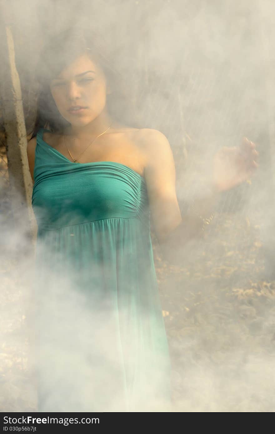 Model posing in smoke