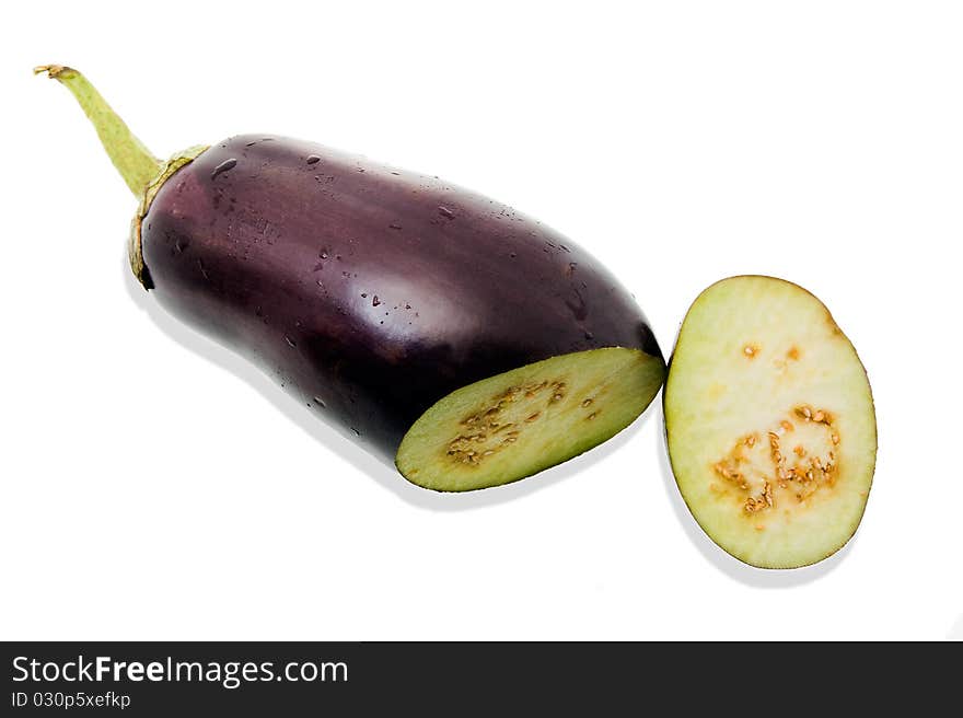 The ripened eggplant from which cut off a slice. The ripened eggplant from which cut off a slice