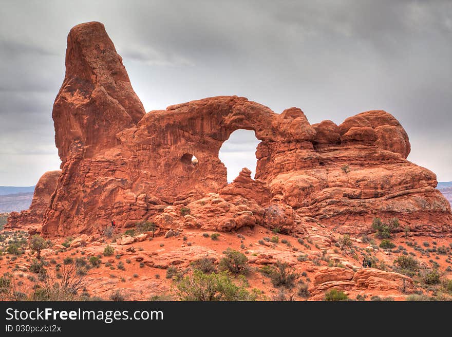 a coming storm appear on a sandstone arch in Arches National Park, Moab,Utah.USA