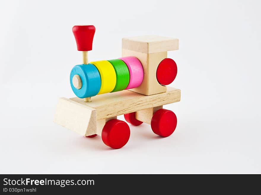 Wooden train toy isolated over white. Wooden train toy isolated over white