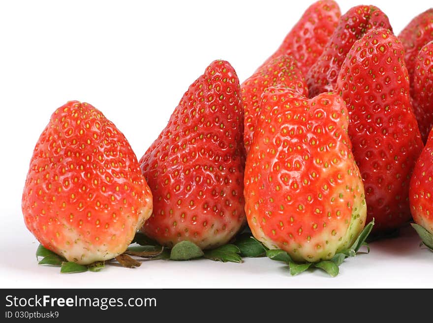 Fresh and tasty strawberries isolated on white background