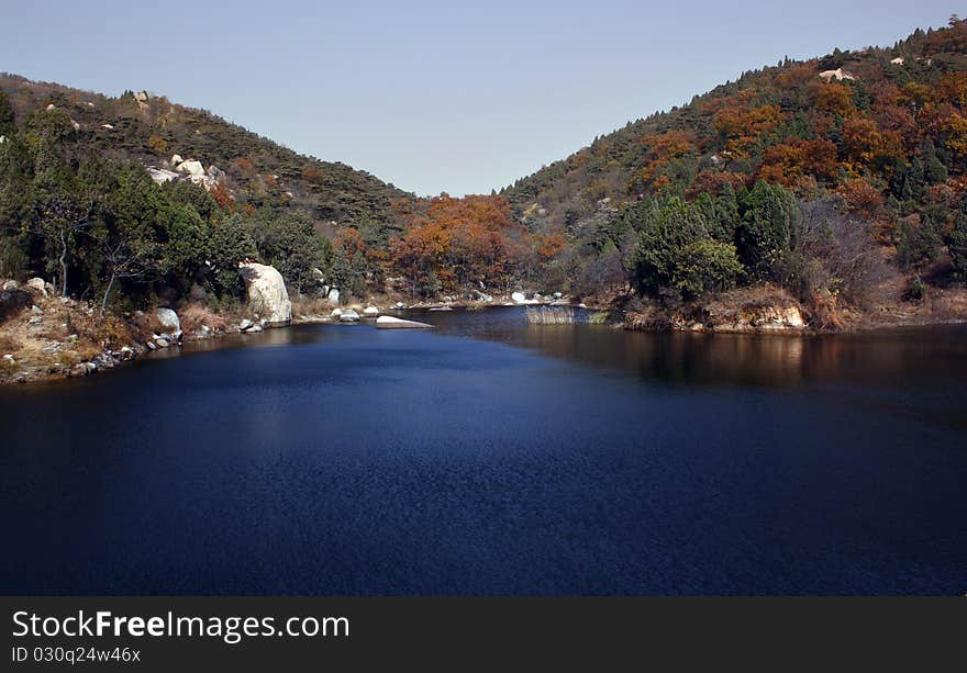 Lake scenery , blue water and hill----