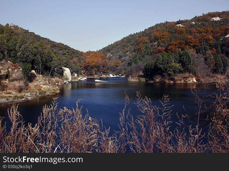 Lake scenery , blue water and hill----