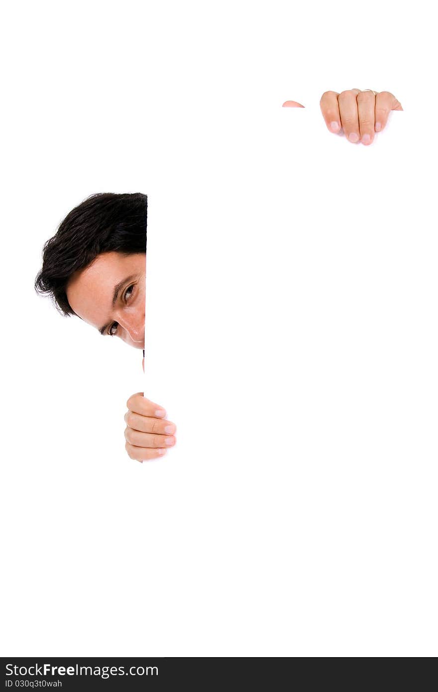 Young man holding blank billboard