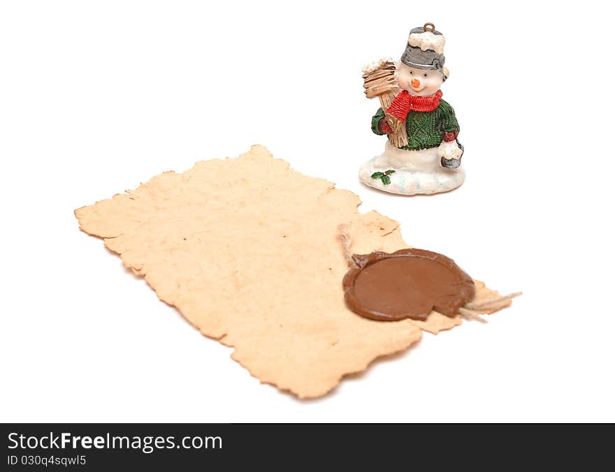 Christmas toy snowman and old paper wax seal