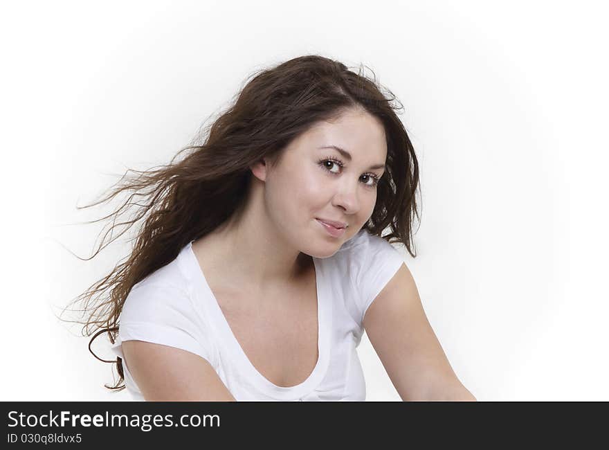 Portrait of the beauty young brunette girl