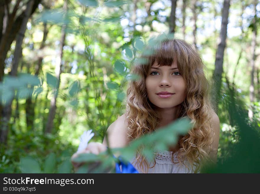 Pretty woman posing in forest. Pretty woman posing in forest