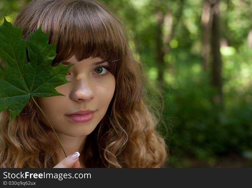 Pretty woman posing in forest. Pretty woman posing in forest