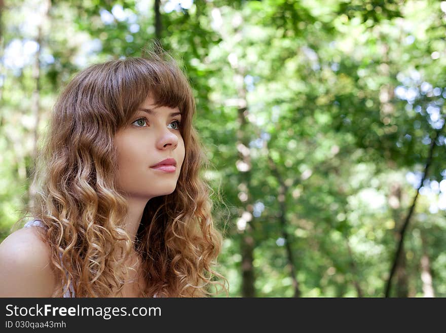 Pretty woman posing in forest. Pretty woman posing in forest