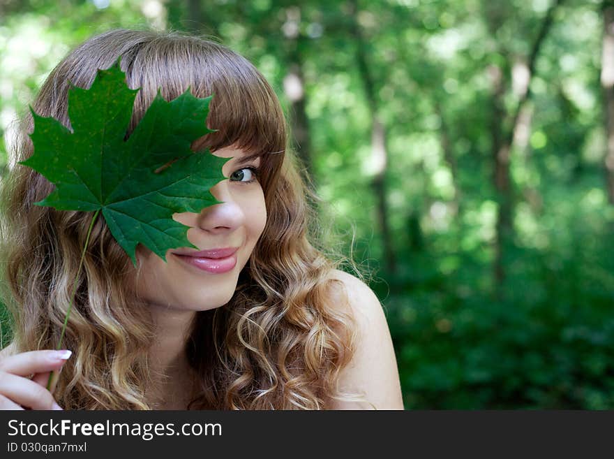 Pretty woman posing in forest. Pretty woman posing in forest