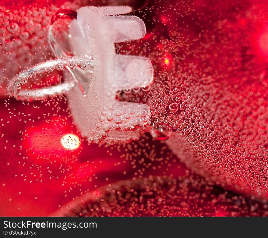 Close up of round red ornaments covered in bubbles