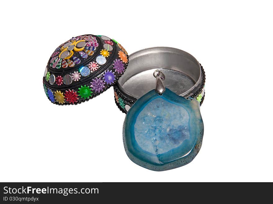 Precious stone necklace on a white open box. file contains clipping path. Precious stone necklace on a white open box. file contains clipping path