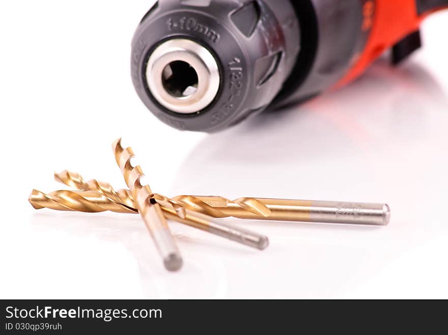 Drill Bits On White With Electric Screw Driver