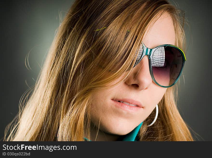 Portrait Of A Woman With Sunglasses