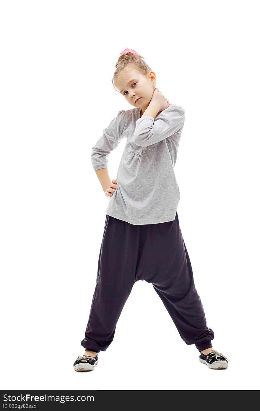 Sporty little girl posing on a white background. Sporty little girl posing on a white background