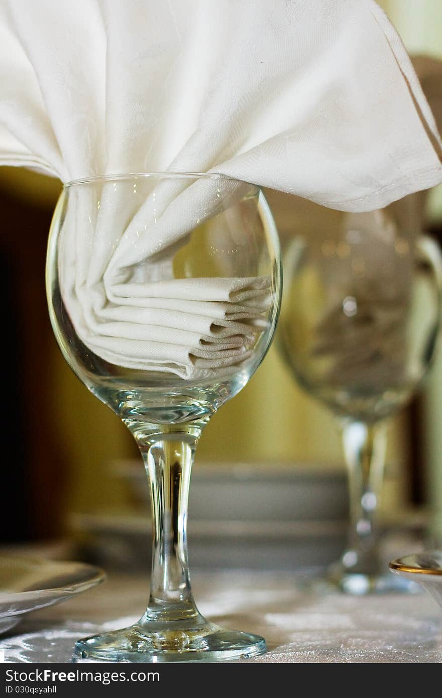 White napkin in a wine glass. White napkin in a wine glass